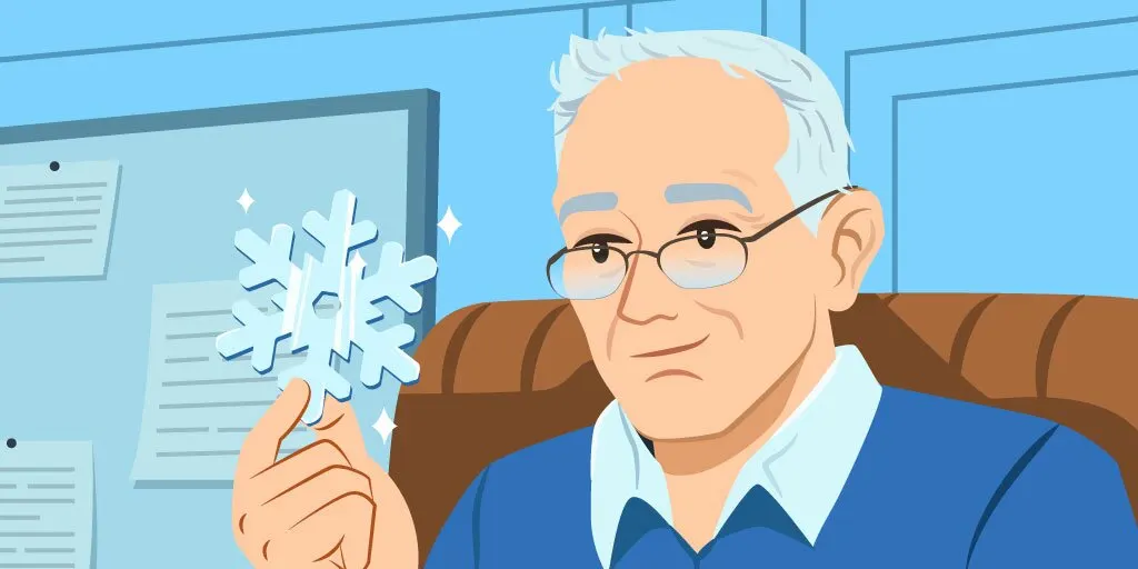 Randy Ingermanson holding a crystal snowflake in his hand